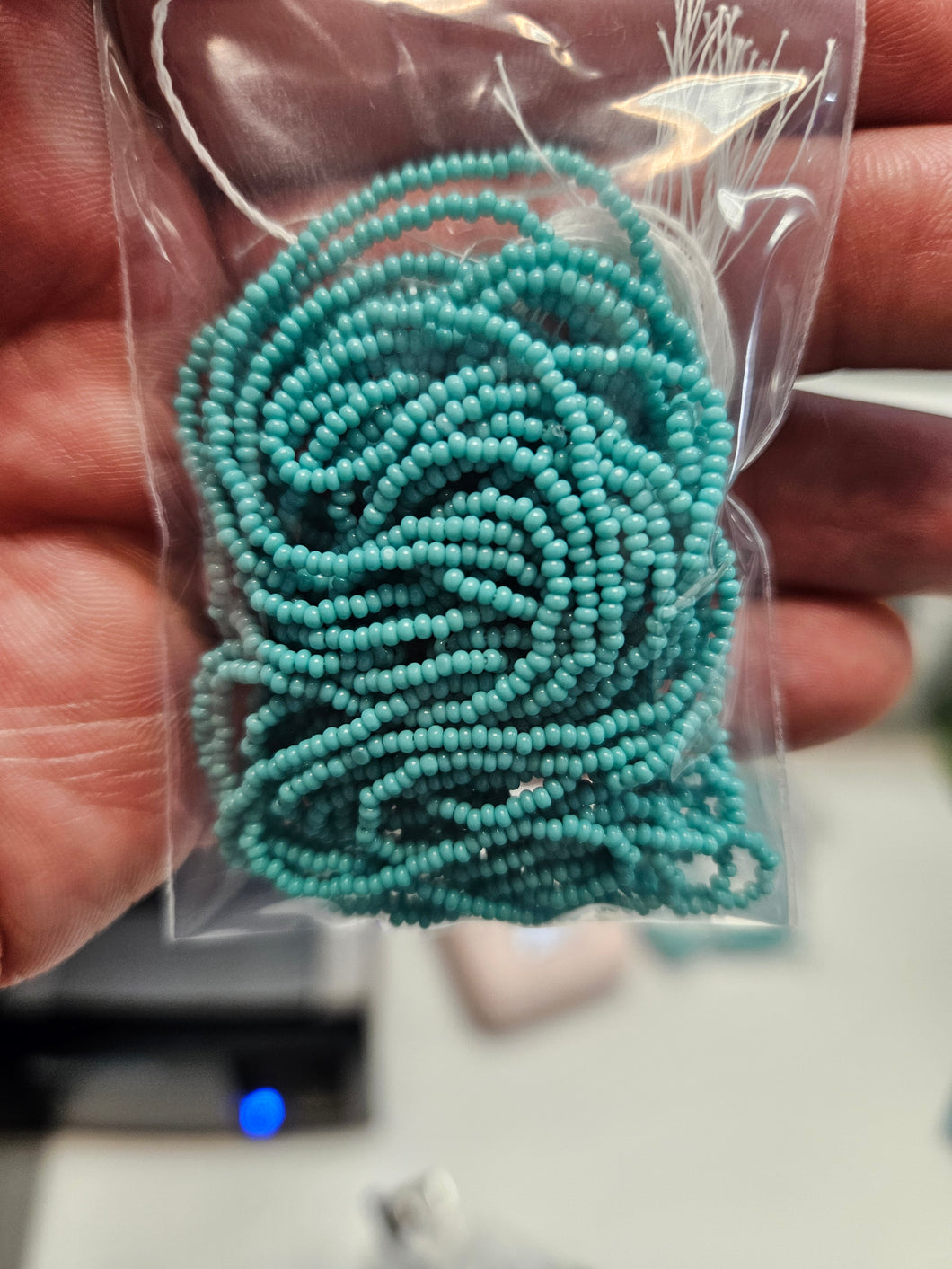 13/0 Cut Opaque Turquoise Strung