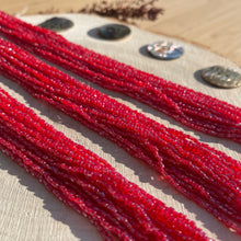 Load image into Gallery viewer, Czech Seed Beads 9/0 3Cut Transparent Red Luster Strung

