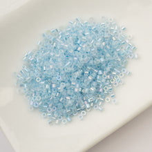 Load image into Gallery viewer, 11/0 Cylin Bead Glow in Dark AB - Blue
