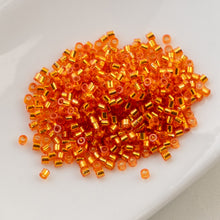 Load image into Gallery viewer, 11/0 Cylin Bead Orange S/L
