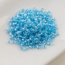 Load image into Gallery viewer, 11/0 Cylin Bead Neon Celestial Ocean
