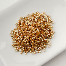 Load image into Gallery viewer, 11/0 Cylin Bead Opaque Toasted Caramel
