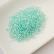 Load image into Gallery viewer, 11/0 Cylin Bead Glow in Dark - Turquoise
