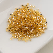 Load image into Gallery viewer, 11/0 Cylin Bead Gold S/L

