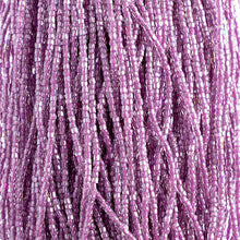 Load image into Gallery viewer, Czech Seed Bead 3Cut 10/0 Crystal/Purple Strung
