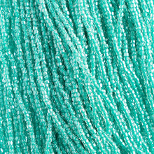 Load image into Gallery viewer, Czech Seed Bead 3Cut 10/0 Crystal/Green Strung

