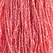 Load image into Gallery viewer, Czech Seed Bead 3Cut 10/0 Transparent Topaz/ Pink Lined Strung
