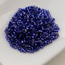 Load image into Gallery viewer, 11/0 Cylin Bead Dark Violet S/L

