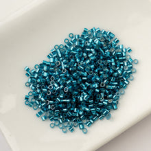 Load image into Gallery viewer, 11/0 Cylin Bead Blue Zircon S/L
