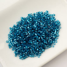 Load image into Gallery viewer, 11/0 Cylin Bead Capri Blue S/L
