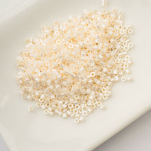 Load image into Gallery viewer, 11/0 Cylin Bead Opaque White Bisque Ceylon

