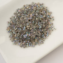 Load image into Gallery viewer, 11/0 Cylin Bead Glow in Dark AB - Grey
