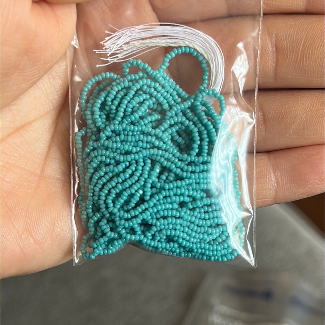 13/0 Cut Opaque Turquoise  Strung