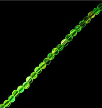 Load image into Gallery viewer, Crystal Lane 7" Glow in the Dark Round Beads (6mm) - Orange AB
